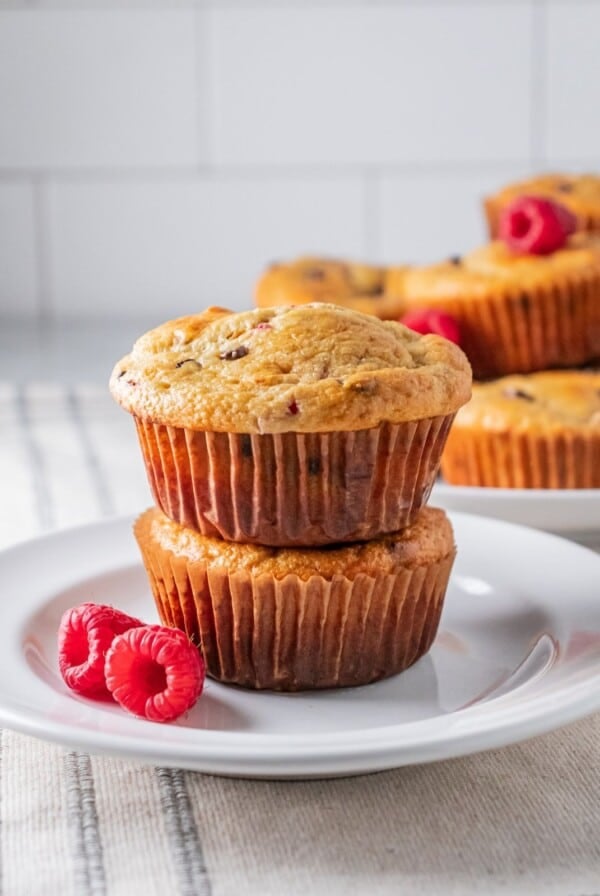 Raspberry muffins on a plate.