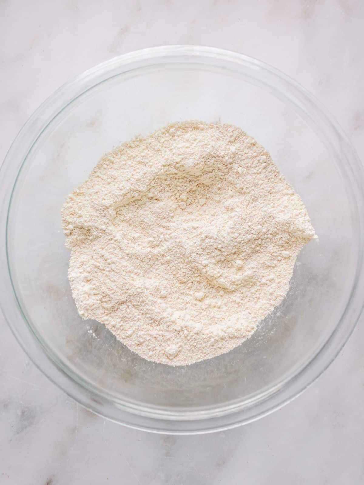 Flour, baking powder, baking soda, and salt in a large mixing bowl.