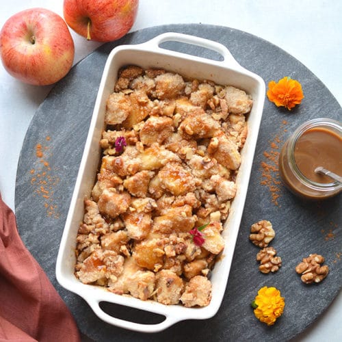 Gluten Free Apple Crisp made with almond flour, cinnamon and lower in sugar. An easy apple crisp that's better balanced in nutrition and dairy free. A healthy dessert recipe that everyone goes crazy for! Gluten Free + Low Calorie + Paleo