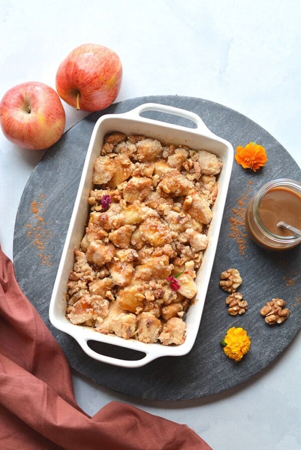 Gluten Free Apple Crisp made with almond flour, cinnamon and lower in sugar. An easy apple crisp that's better balanced in nutrition and dairy free. A healthy dessert recipe that everyone goes crazy for! Gluten Free + Low Calorie + Paleo