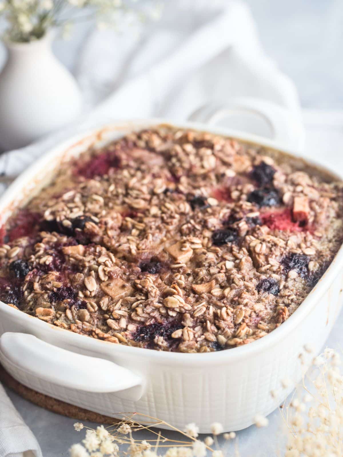 Protein baked oats in a casserole dish on a table. 