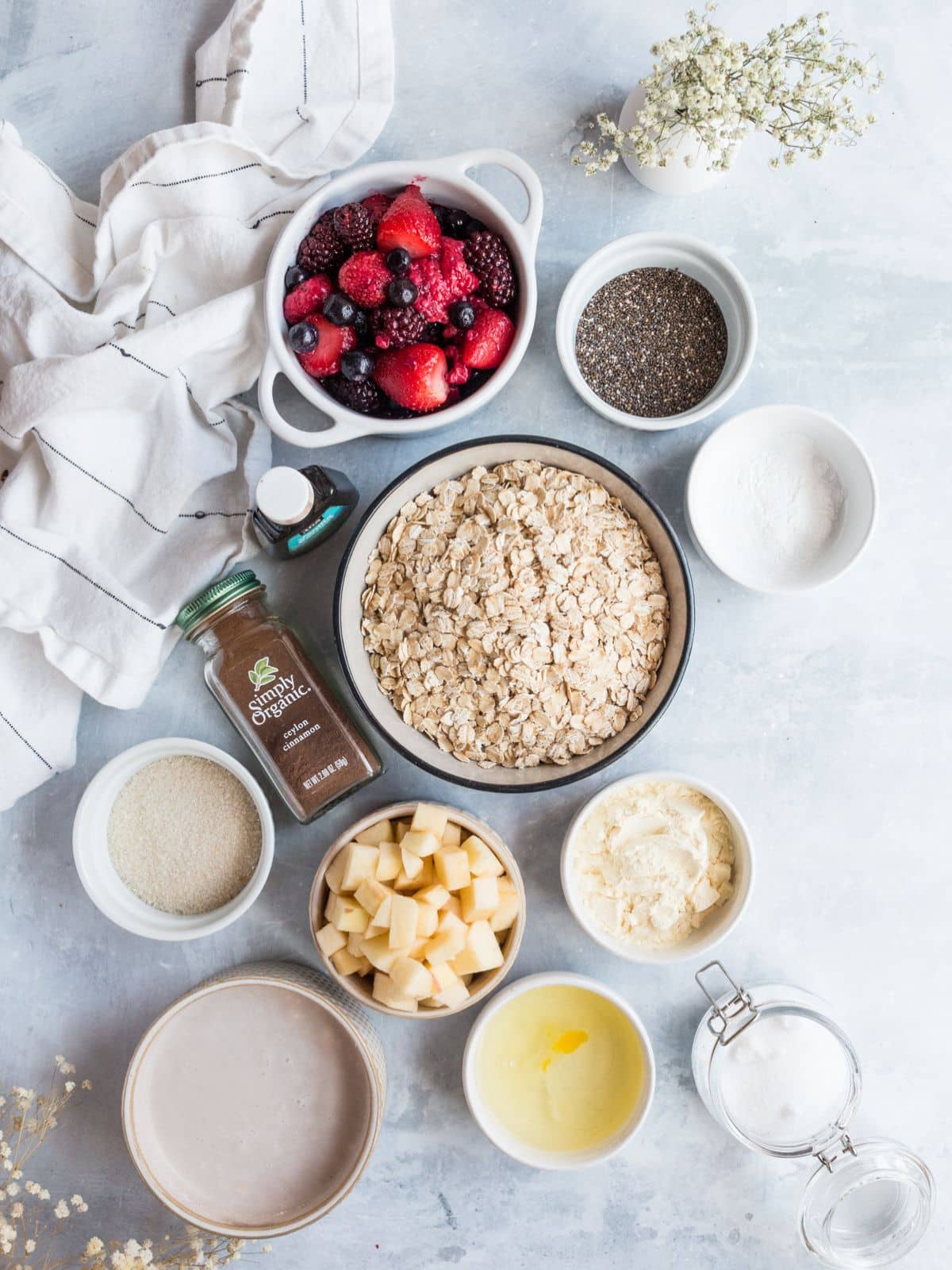 Ingredients for protein oatmeal bake on the table in bowls.