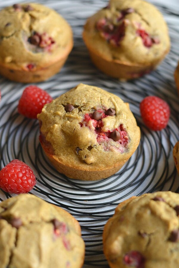 These Skinny Raspberry Chocolate Chip Muffins are easy to make for a healthy breakfast or snack! A gluten free and low calorie muffin recipe made from real food ingredients. With bursts of sweet raspberry and chocolate in every bite, this muffin is so delicious you won't believe it's good for you. Gluten Free + Low Calorie