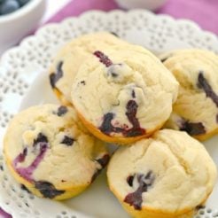 Made with sour cream, applesauce, milk, and gluten free flour, these delicious 94 calorie Sour Cream Blueberry Muffins keep your waist slim.