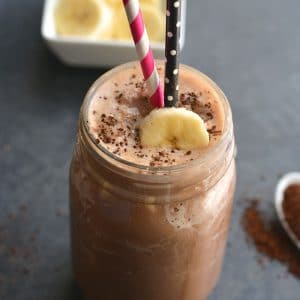 Chocolate Mocha Fudge Protein Smoothie! Get your caffeine fix with a plant based smoothie. Made with just 4 ingredients this smoothie is perfect for post workout recovery or a quick energy boost. Gluten Free + Low Calorie + Vegan + Paleo