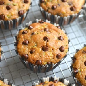 These Healthier Chocolate Chip Zucchini Muffins are dairy free, made with real food ingredients and are lighter and healthier. A gluten free snack you can't resist! Perfect for post workout, breakfast or a snack! Gluten Free + Low Calorie