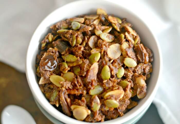 Taste the flavors of fall in this savory Pumpkin Gingerbread Granola. A delicious breakfast or healthy nutty snack! Grain Free, Gluten Free, Paleo, Vegan!