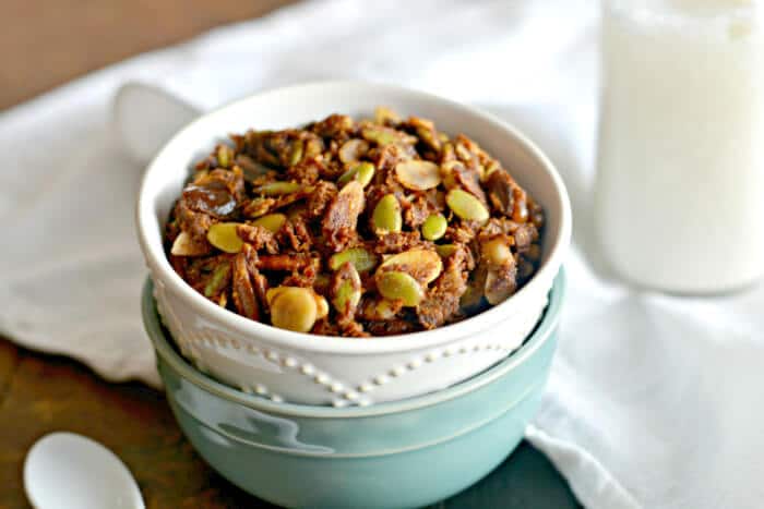 Taste the flavors of fall in this savory Pumpkin Gingerbread Granola. A delicious breakfast or healthy nutty snack! Grain Free, Gluten Free, Paleo, Vegan!
