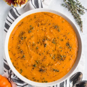 Butternut Sweet Potato Soup is a comforting, veggie packed soup. A butternut squash soup made low calorie, gluten free, Paleo and Vegan! A healthy and delicious bowl of veggie packed goodness!