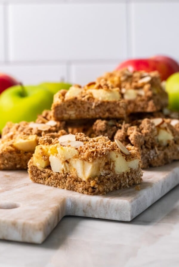 Healthy Apple Cinnamon Crumb Bars are a tasty fall treat made gluten free, dairy free and low calorie! They taste like a slice of apple pie in a bar.