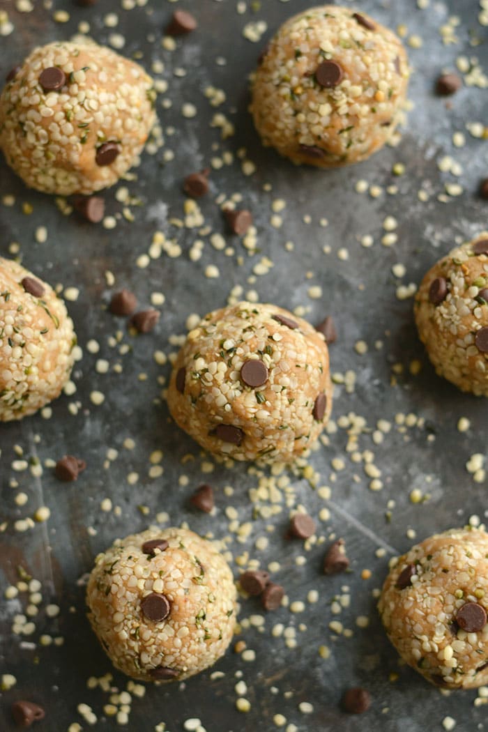 Hemp Seed Energy Bites made with creamy nut butter, chocolate & oat flour. High in omega-3 & low in sugar, a healthy 125 calorie snack perfect for on the go! Gluten Free + Low Calorie + Vegan