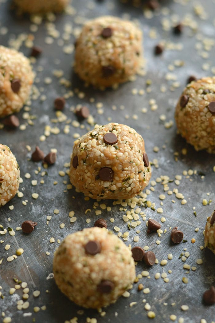 Hemp Seed Energy Bites made with creamy nut butter, chocolate & oat flour. High in omega-3 & low in sugar, a healthy 125 calorie snack perfect for on the go! Gluten Free + Low Calorie + Vegan