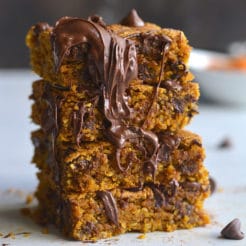 Pumpkin Chocolate Chip Cookie Bars are made with healthier baking ingredients for a better for you baked treat! Gluten free, lower in sugar and absolutely delicious! Vegan + Low Calorie + Gluten Free
