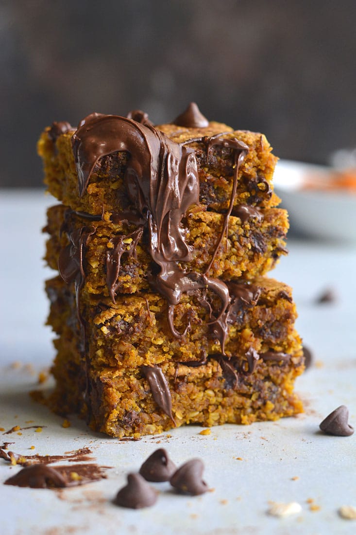 Pumpkin Chocolate Chip Cookie Bars are made with healthier baking ingredients for a better for you baked treat! Gluten free, lower in sugar and absolutely delicious! Vegan + Low Calorie + Gluten Free