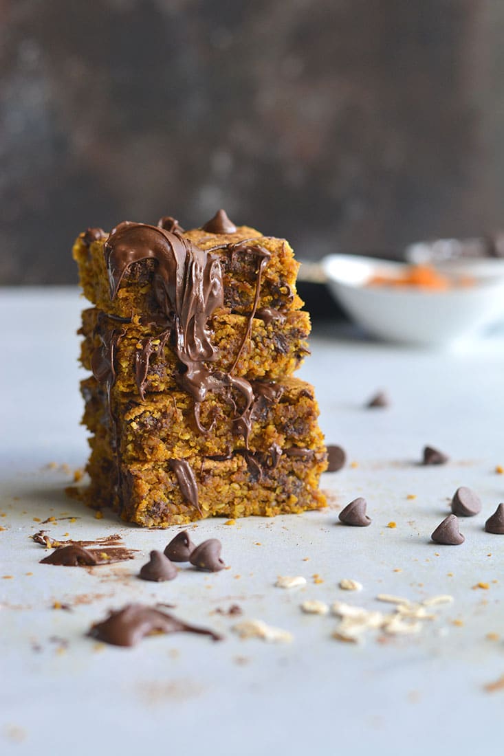 Pumpkin Chocolate Chip Cookie Bars are made with healthier baking ingredients for a better for you baked treat! Gluten free, lower in sugar and absolutely delicious! Vegan + Low Calorie + Gluten Free