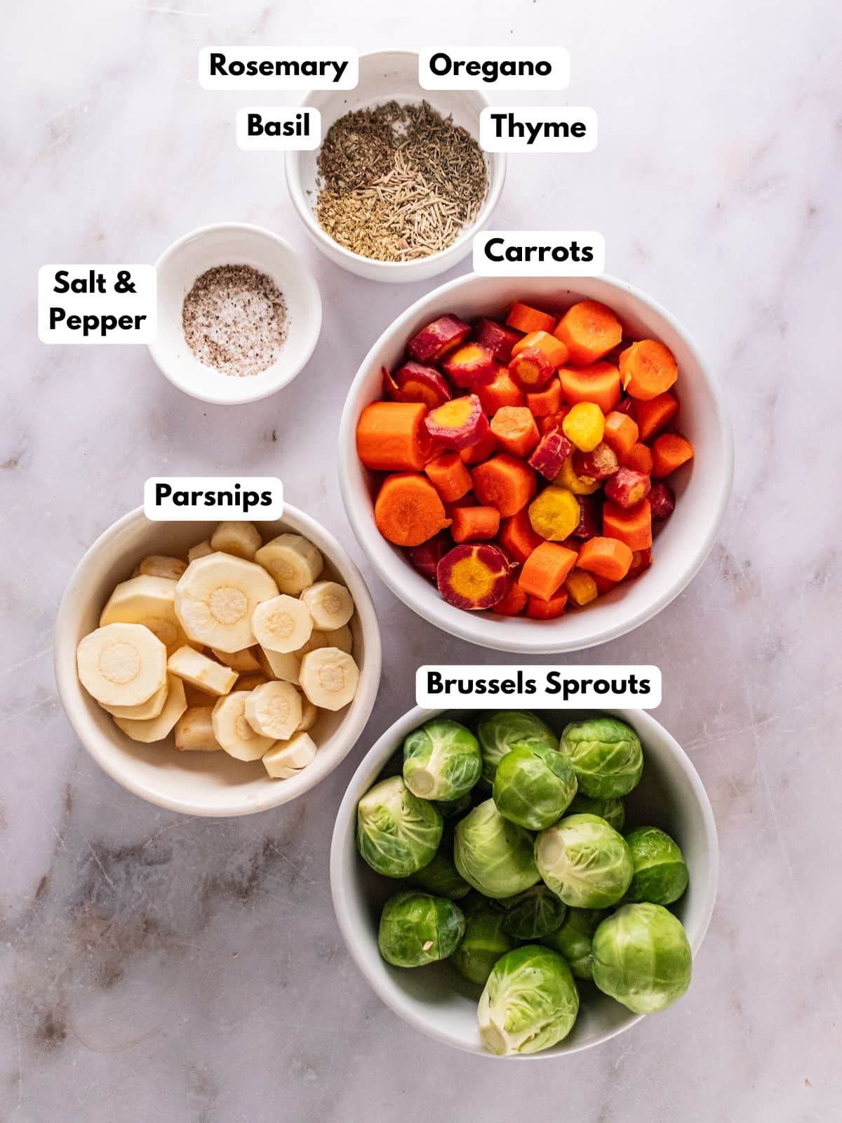 Ingredients for making roasted veggies in bowls.