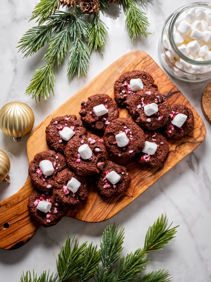 Healthy Peppermint Hot Chocolate Cookies are low calorie and gluten free. Made gooey on the inside and chewy on the outside, these lighter holiday cookies are fun and easy! 