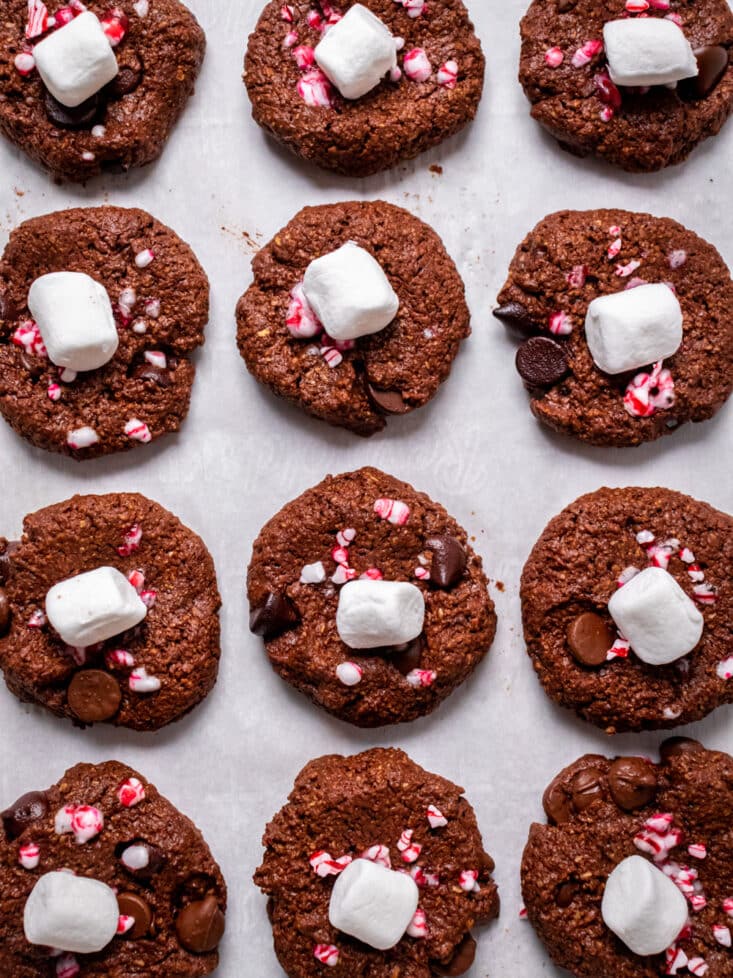 Healthy Peppermint Hot Chocolate Cookies are low calorie and gluten free. Made gooey on the inside and chewy on the outside, these lighter holiday cookies are fun and easy! 