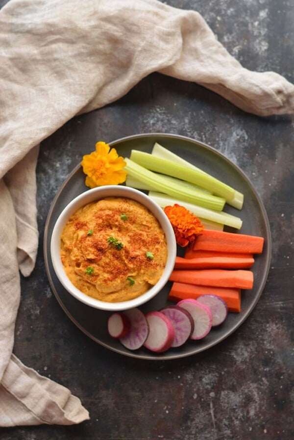 Whole30 No Bean Pumpkin Hummus! This thick and creamy "hummus" is made with zucchini and pumpkin instead of chickpeas. A delicious, low calorie dip, dressing, sauce or marinade! Gluten Free + Vegan + Paleo + Low Calorie + Whole30