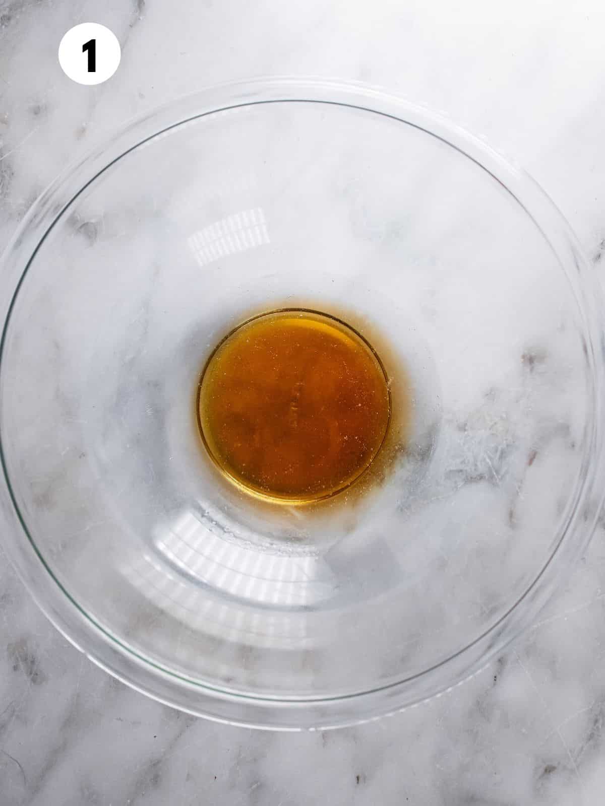 Liquid ingredients for making these cookies in a bowl.