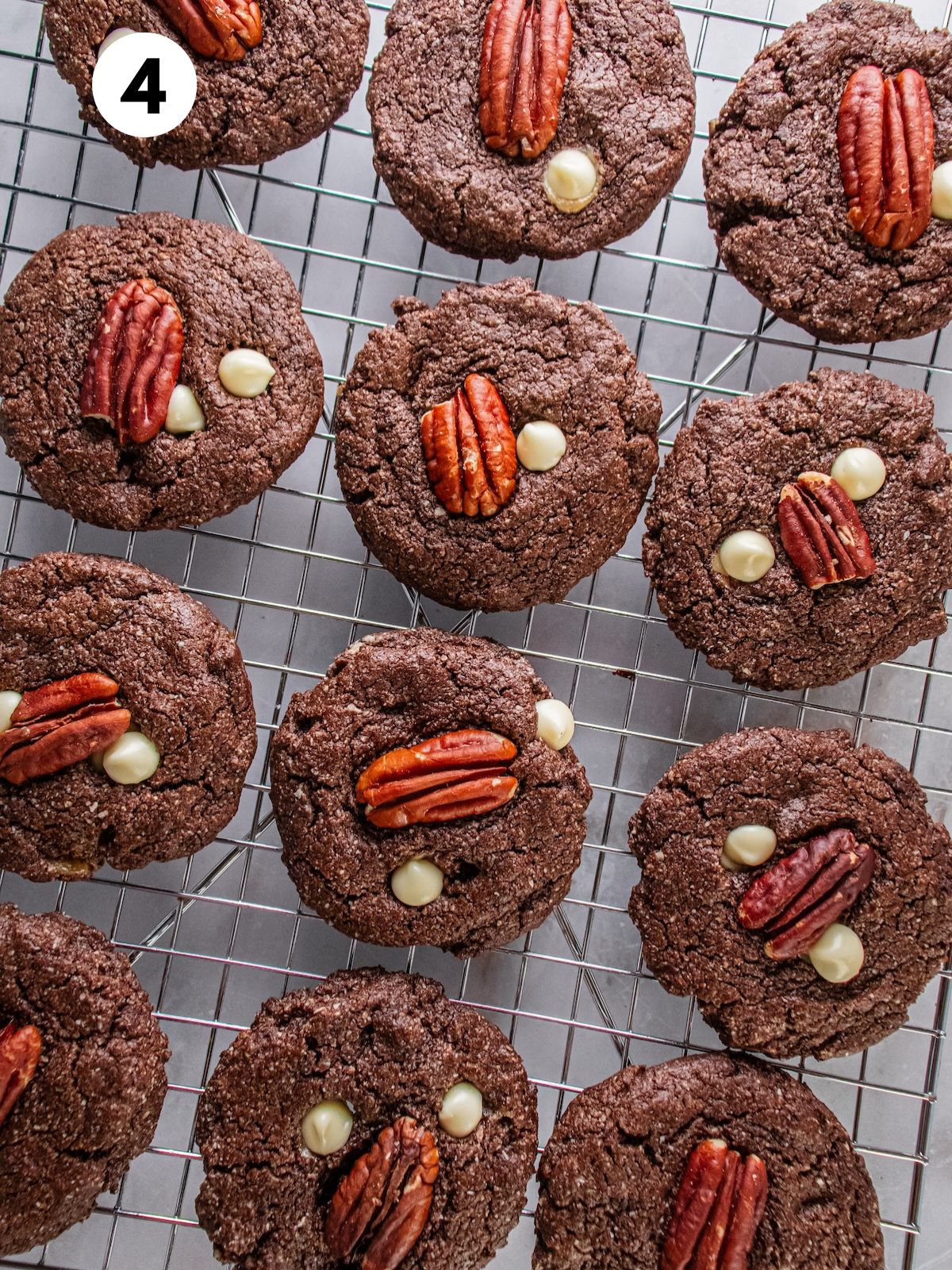 Baked cookies on a cooling rack.