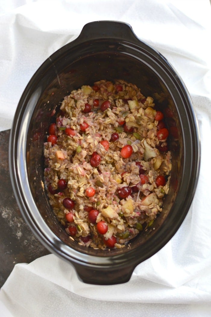 Cranberry Apple Crockpot Oatmeal is a healthier oatmeal balanced with protein & healthy fats. Just toss everything in a crockpot for an easy, make ahead breakfast! Gluten Free + Low Calorie