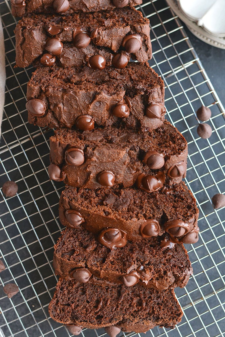 Insanely delicious Dark Chocolate Butternut Squash Bread! Made gluten free with whole grains and lightly sweetened, this protein packed bread is a chocolate lover's dream. You won't even know it has butternut squash or is good for you! Gluten Free + Low Calorie