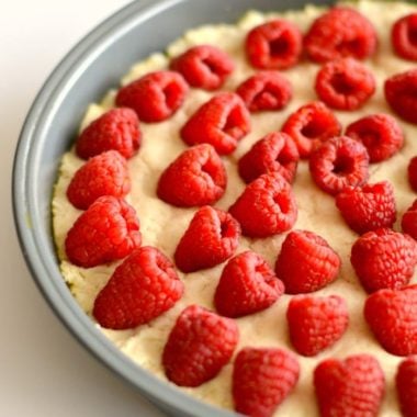 Bursting with lemon and with swirls of fresh raspberries, this elegant and Healthy Raspberry Lemon Cake is healthier cake to enjoy!