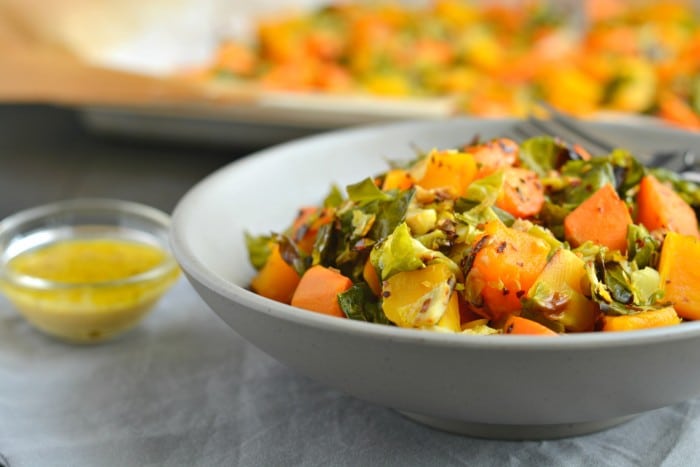 Brussels Sprouts Sweet Potato Salad is a warm and hearty salad. Made with roasted butternut squash, sweet potatoes and shredded brussels sprouts this nutrition packed salad is full of sweet and savory flavors!
