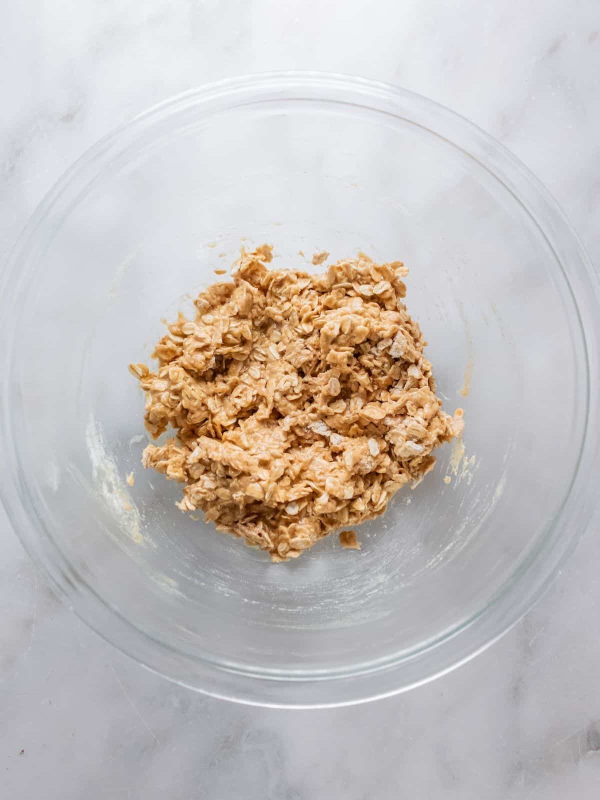 Egg white, honey, salt, cinnamon, and almond extract in a mixing bowl.