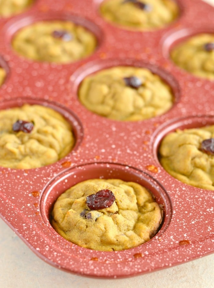 Winter Squash Muffins made with cranberries, cinnamon and butternut squash. Gluten free and low calorie, this cozy muffin is a delicious snack on a winter day!