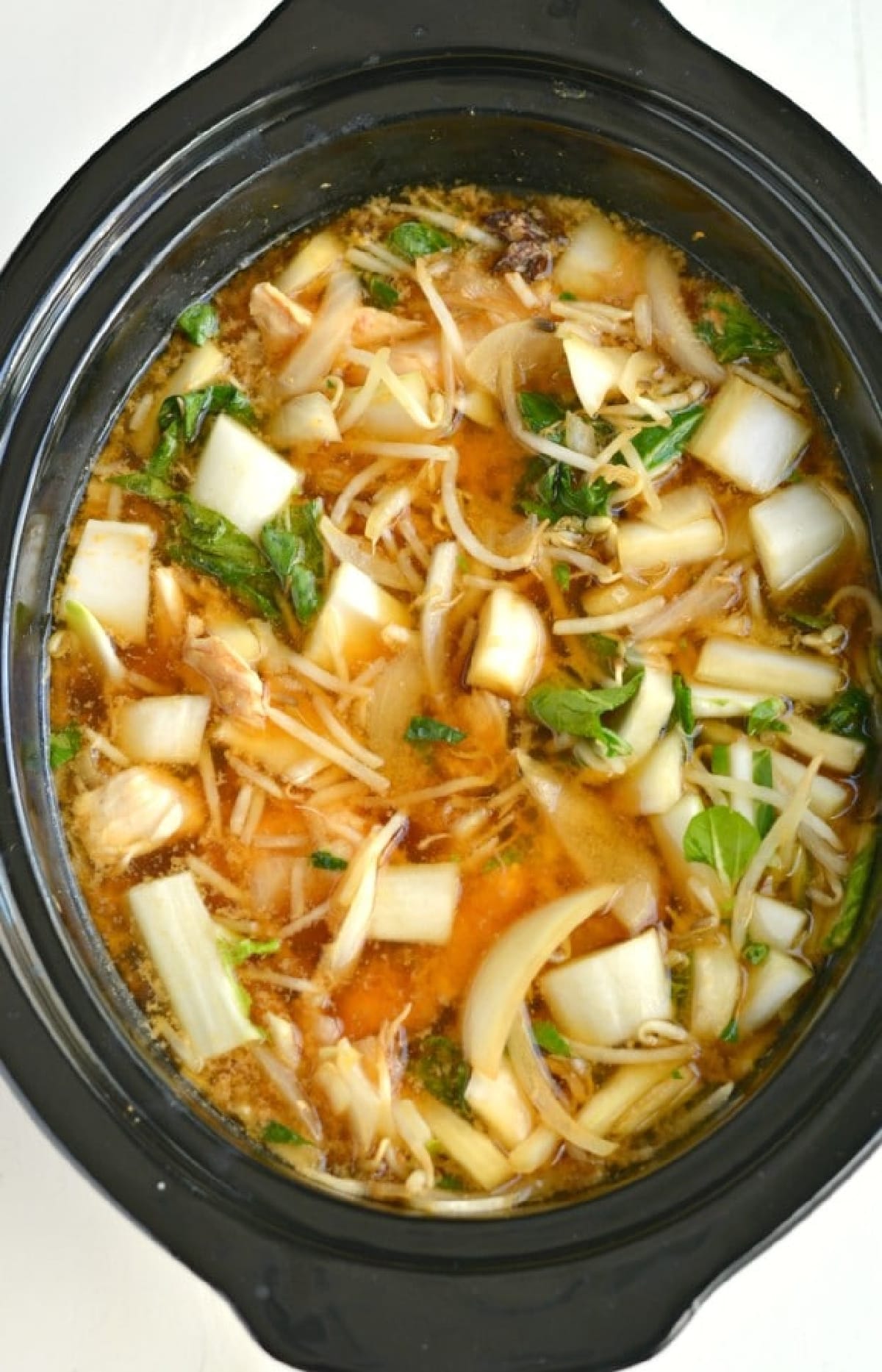 Vietnamese chicken soup in a slow cooker.