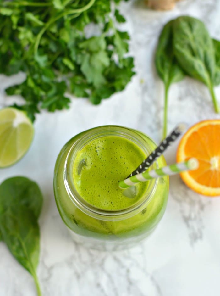 A Classic everyday Green Juice! Made with spinach, parsley, ginger, apple, oranges and lime, this addicting Green Juice is loaded with nutrients and layered with flavors of citrus and spice with an ounce of tang!
