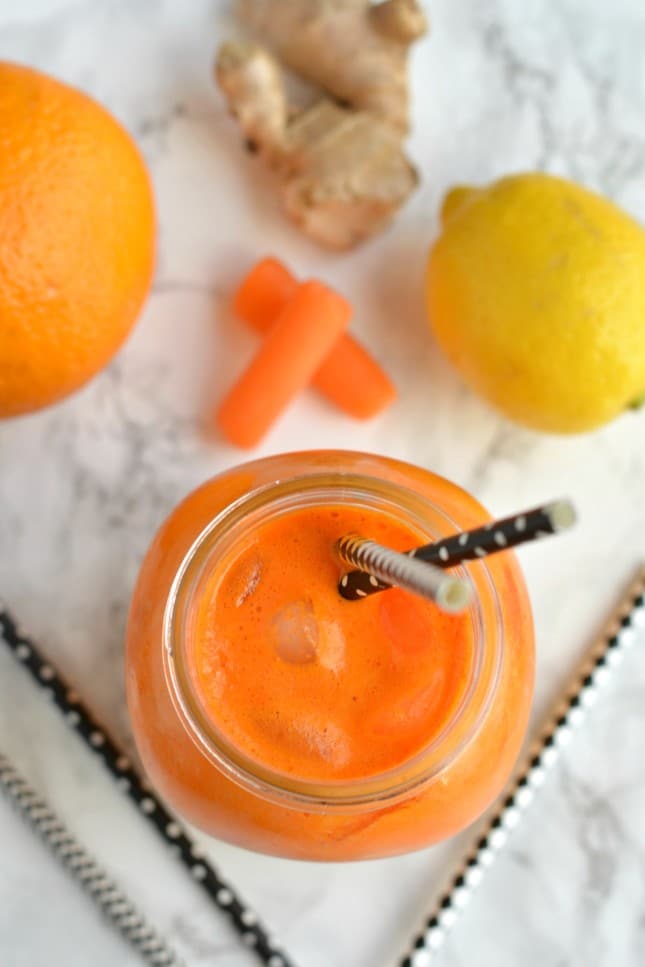 Boost your immune system with an Orange Carrot Ginger Juice packed with healthy citrus and carrots. This juice has tons of flavor, a zing of tartness and is full of nourishment. The perfect juice to spring clean your diet!