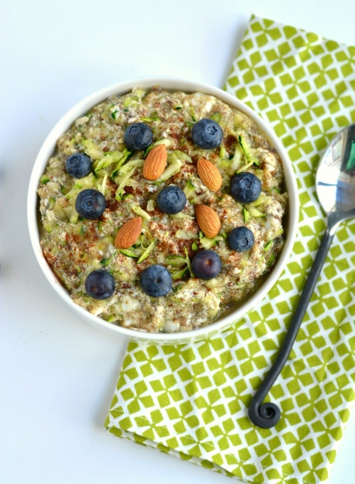 Zucchini Oatless Oatmeal is a Paleo twist on a classic bowl of morning oatmeal. Made with eggs, almond milk, zucchini, applesauce, flaxseed and cinnamon, this simple bowl of goodness is packed with protein and fiber. A nutritious way to stay full all morning!