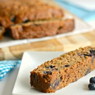 Gluten Free Zucchini Blueberry Bread! This hidden veggie bread is bursting with natural sweetness, loaded with nutrients & fiber. A wonderful anytime bread that even picky eaters will love! Gluten Free + Low Calorie