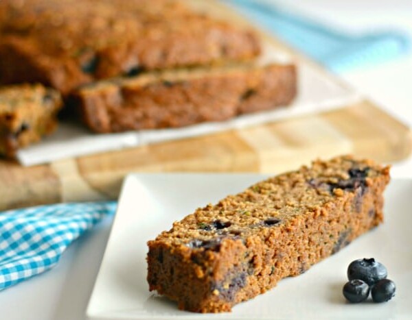 Gluten Free Zucchini Blueberry Bread! This hidden veggie bread is bursting with natural sweetness, loaded with nutrients & fiber. A wonderful anytime bread that even picky eaters will love! Gluten Free + Low Calorie