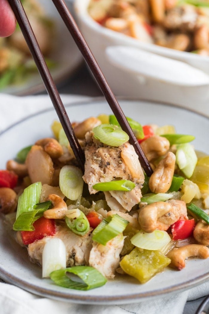 Cashew Chicken Bake is a simple, low calorie casserole dinner packed with protein and vegetables. A hearty gluten free meal that's filling and the whole family will love!