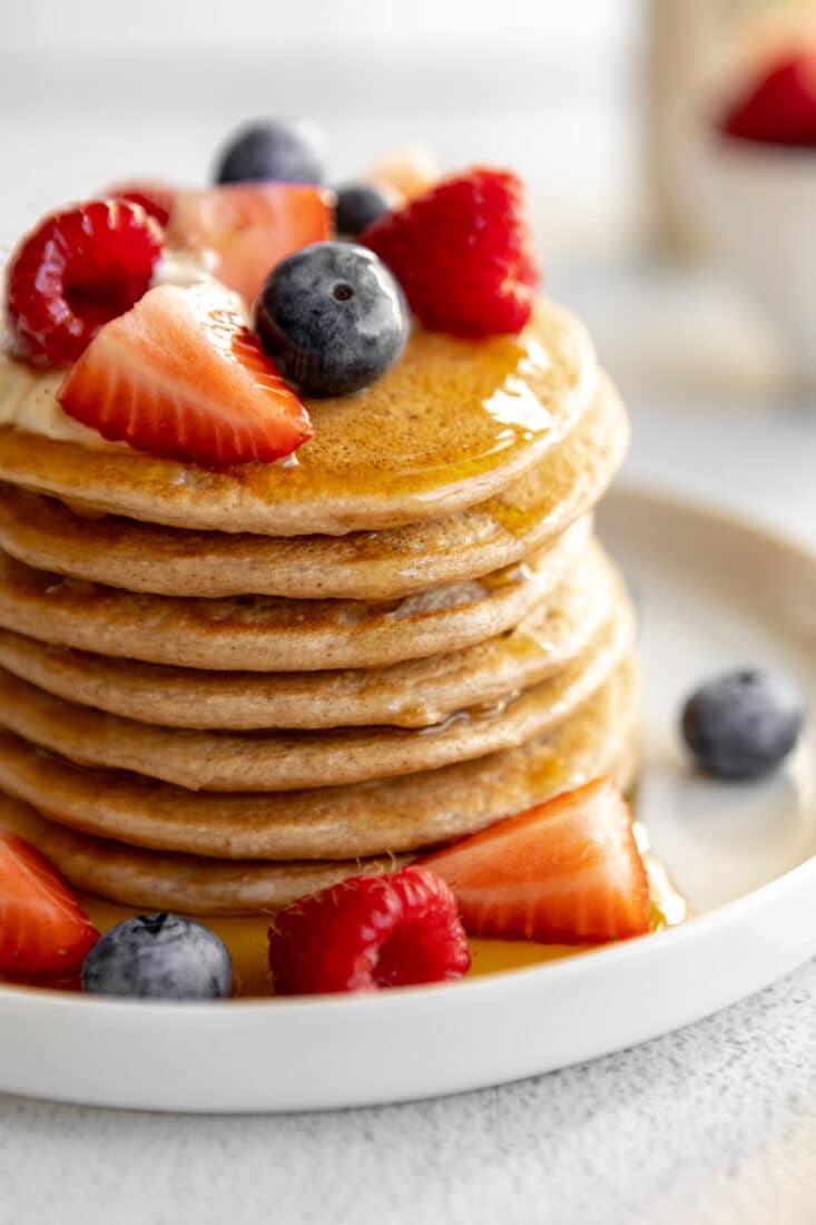 Cottage Cheese Pancakes made with four healthy ingredients and crazy delicious. They're low calorie, gluten free and super simple to make. These protein pancakes are soon to be your new everyday breakfast favorite!