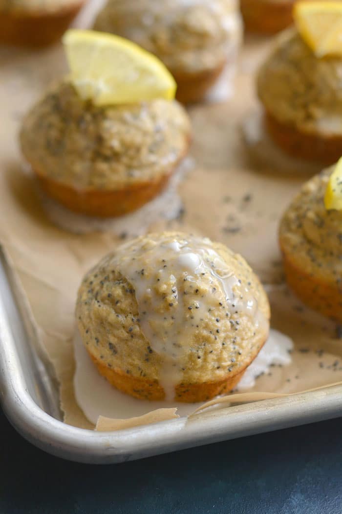 Lemon Orange Poppyseed Muffins! Lightly sweetened, creamy and bursting with citrus flavor. These muffins are quick to make, super soft and are a healthier treat! Gluten Free + Low Calorie