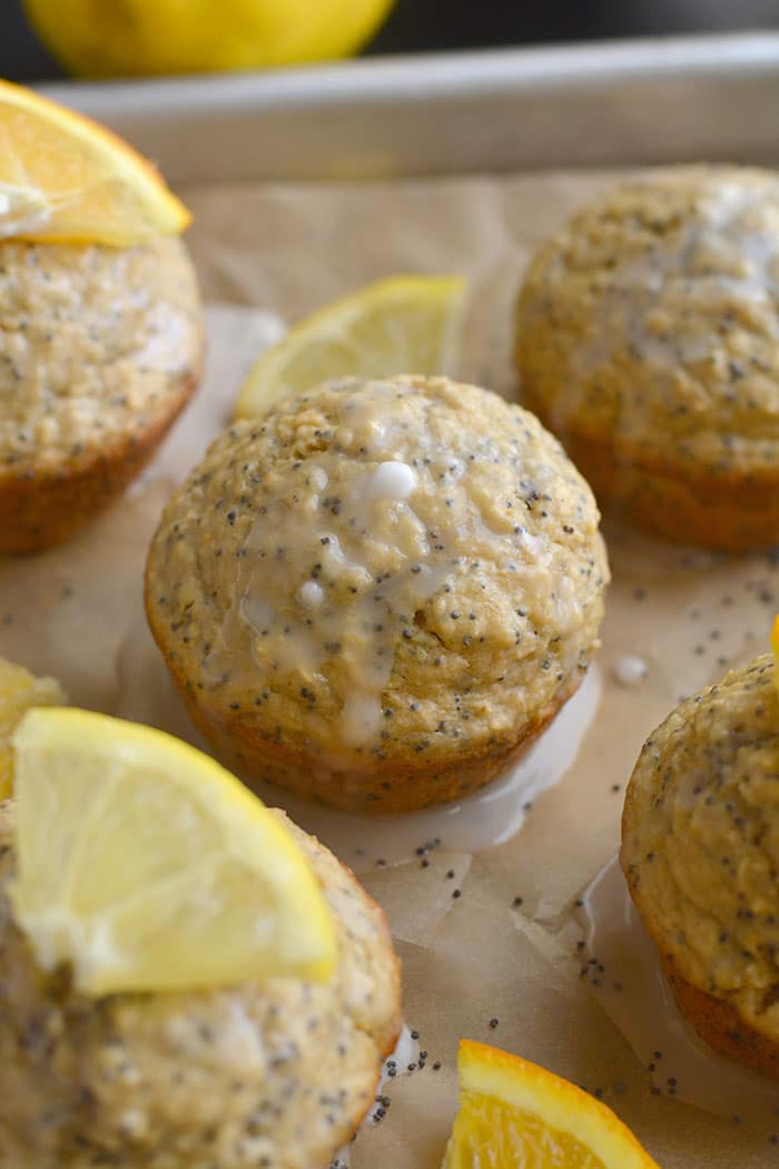 Lemon Orange Poppyseed Muffins! Lightly sweetened, creamy and bursting with citrus flavor. These muffins are quick to make, super soft and are a healthier treat! Gluten Free + Low Calorie