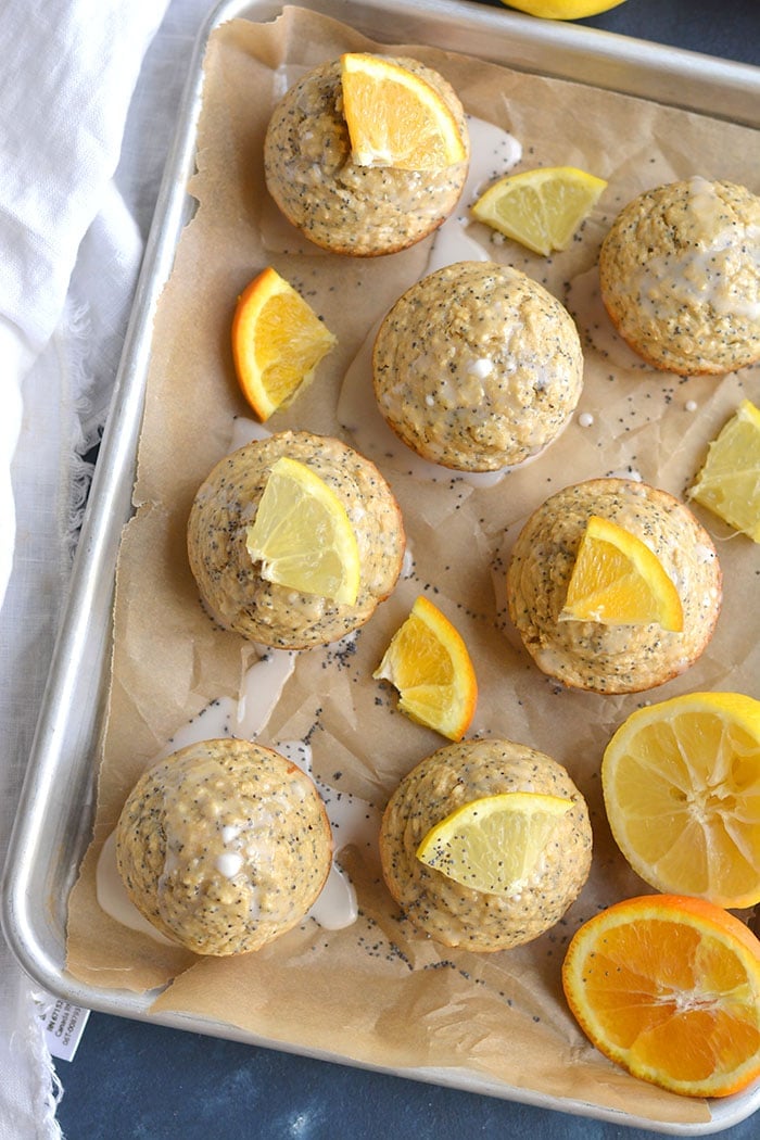 Lemon Orange Poppyseed Muffins! Lightly sweetened, creamy and bursting with citrus flavor. These muffins are quick to make, super soft and are a healthier treat! Gluten Free + Low Calorie