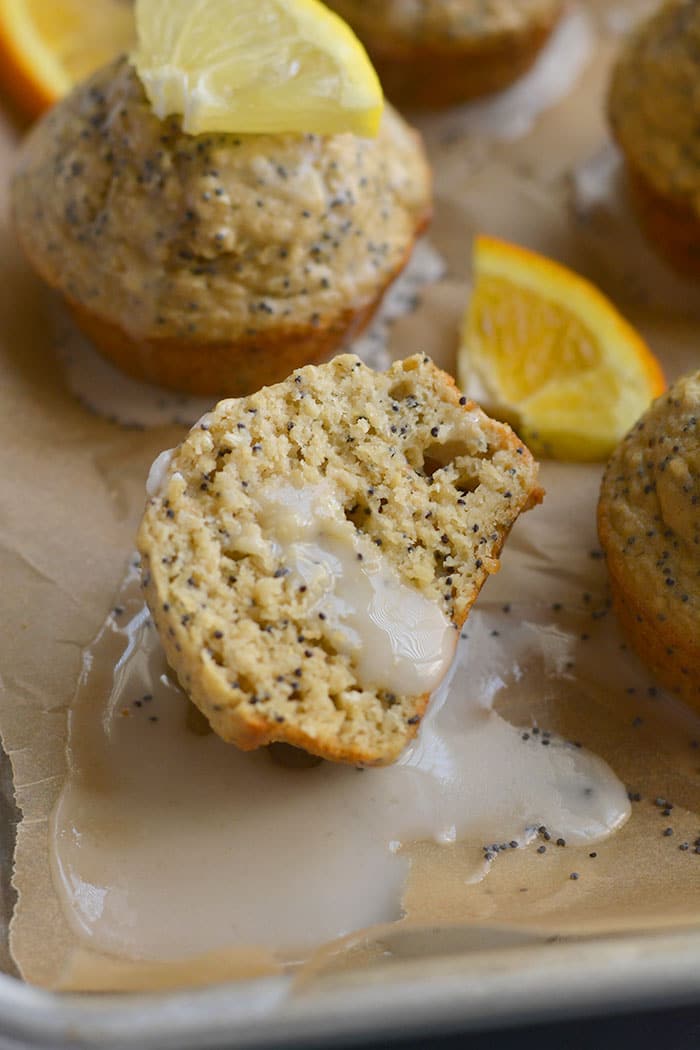 Lemon Orange Poppyseed Muffins! Lightly sweetened, creamy and bursting with citrus flavor. These muffins are quick to make, super soft and are a healthier treat! Gluten Free + Low Calorie