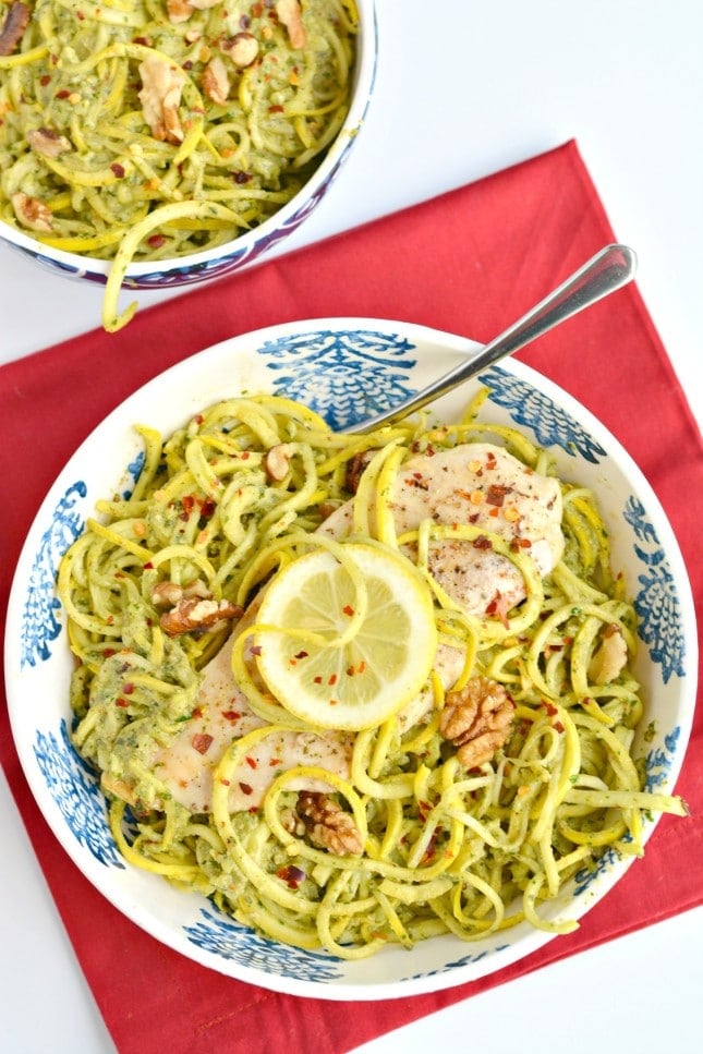 Baked chicken tops spiralized squash with a homemade walnut pesto in this Walnut Pesto Chicken Summer Squash. A simple 30 minute, HEALTHY meal that's Whole 30 compliant, Paleo, Gluten Free and low calorie friendly!