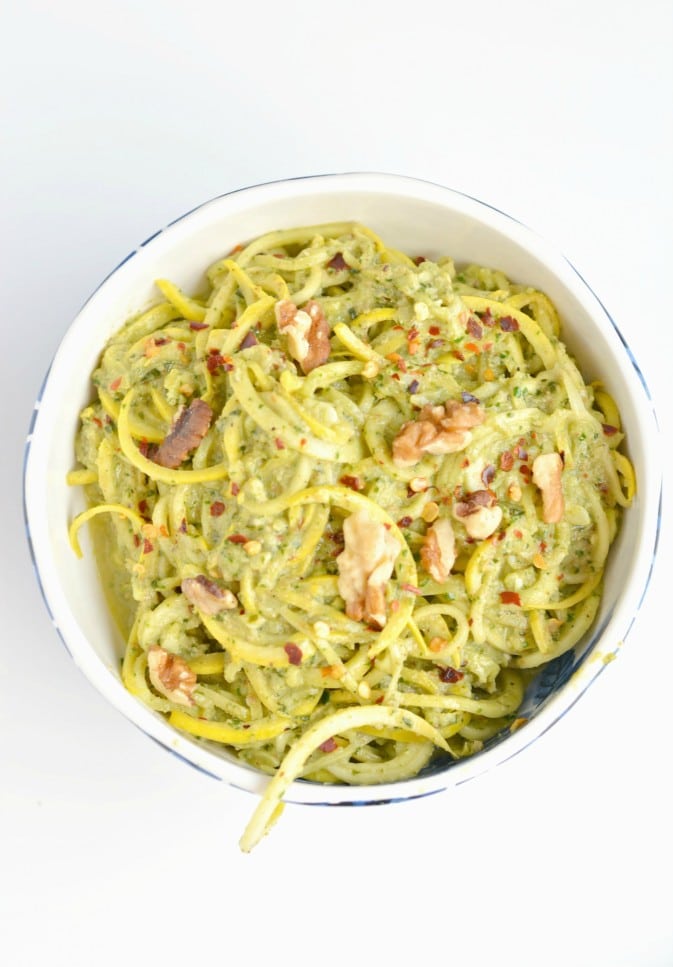 Baked chicken tops spiralized squash with a homemade walnut pesto in this Walnut Pesto Chicken Summer Squash. A simple 30 minute, HEALTHY meal that's Whole 30 compliant, Paleo, Gluten Free and low calorie friendly!