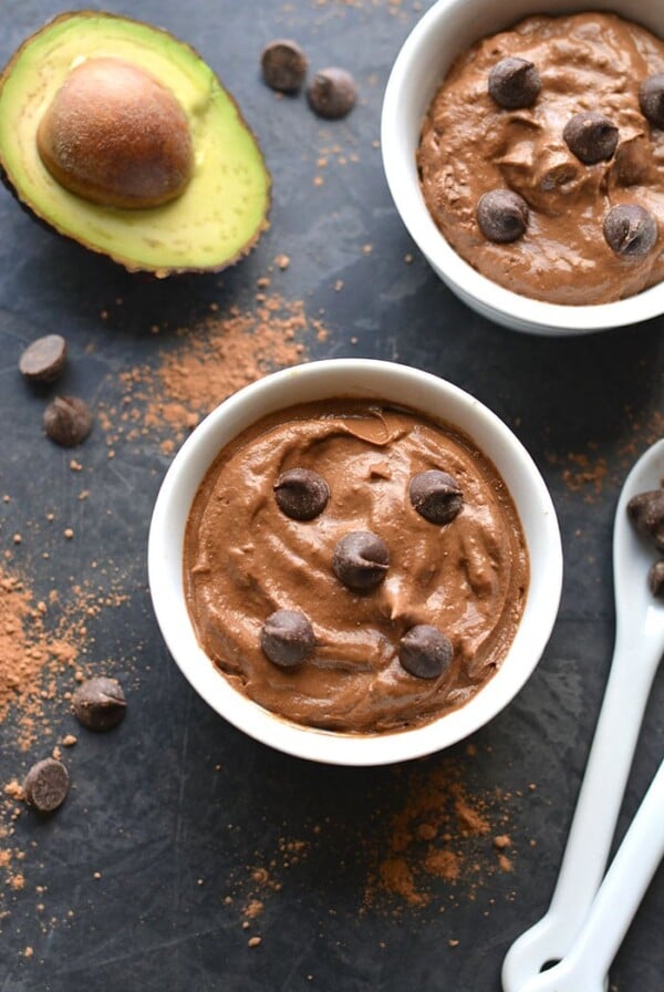 Healthy Chocolate Avocado Pudding with Greek Yogurt! This low calorie pudding is high protein and low sugar and made in two minutes in a blender. A healthy chocolate treat to bust cravings! Gluten Free + Low Calorie