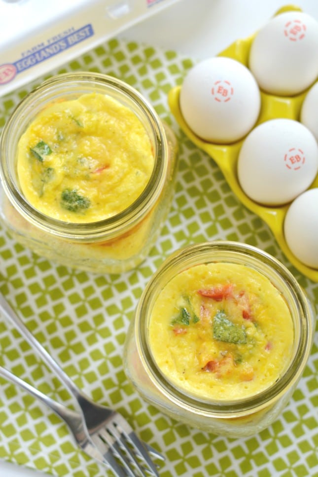 Mason Jar Eggs are the perfect on-the-go protein packed breakfast! These make ahead eggs are super easy, store fresh in the fridge for days and are completely customizable to your taste buds! 