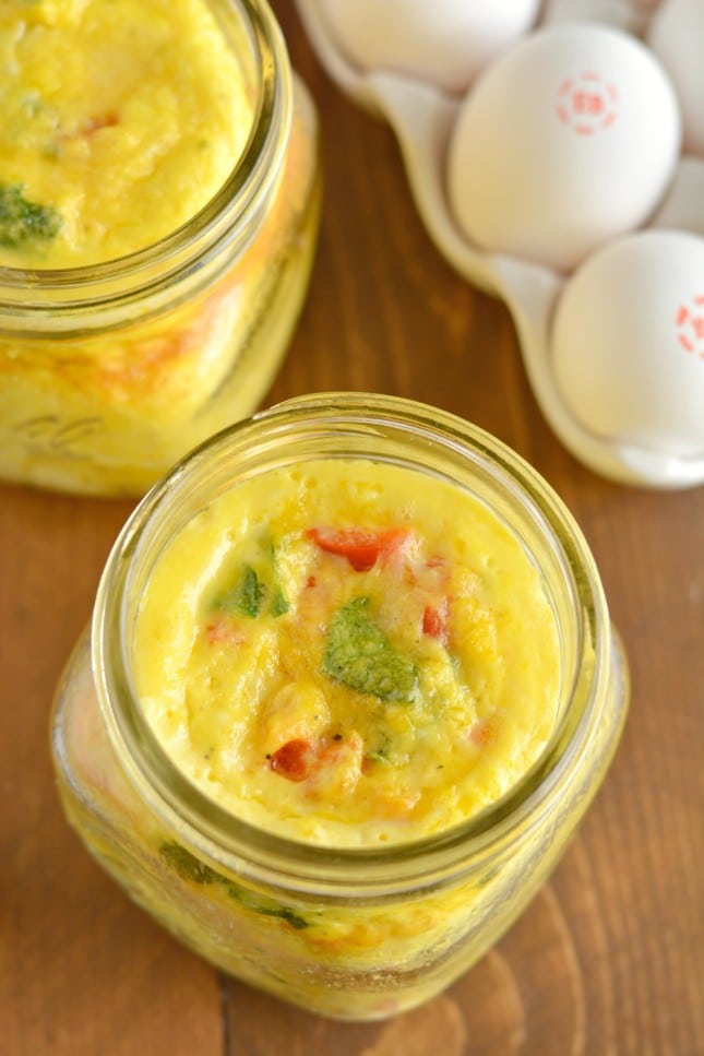 Mason Jar Eggs are the perfect on-the-go protein packed breakfast! These make ahead eggs are super easy, store fresh in the fridge for days and are completely customizable to your taste buds! 