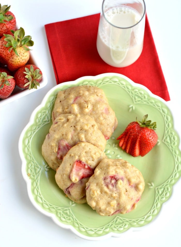 Healthy Strawberry Oatmeal Cookies! Chewy & creamy cookies filled with Greek yogurt, lemon, applesauce & fresh strawberries. A tasty breakfast or anytime snack under 100 calories!