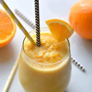 This Healthy Orange Julius Smoothie is made with 5 ingredients in 5 minutes. A refreshing spin on an orange vanilla smoothie that's lighter and waist-friendly! Whole30 + Gluten Free + Low Calorie + Vegan + Paleo